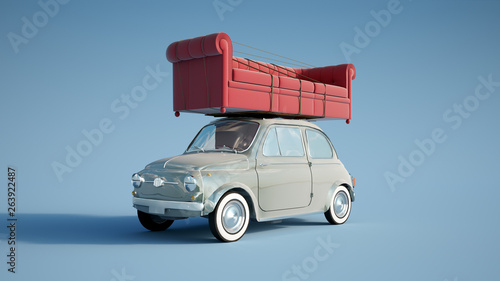 Small retro car with big sofa