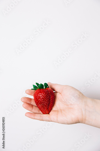 Woman Holding Fresh Strawberries