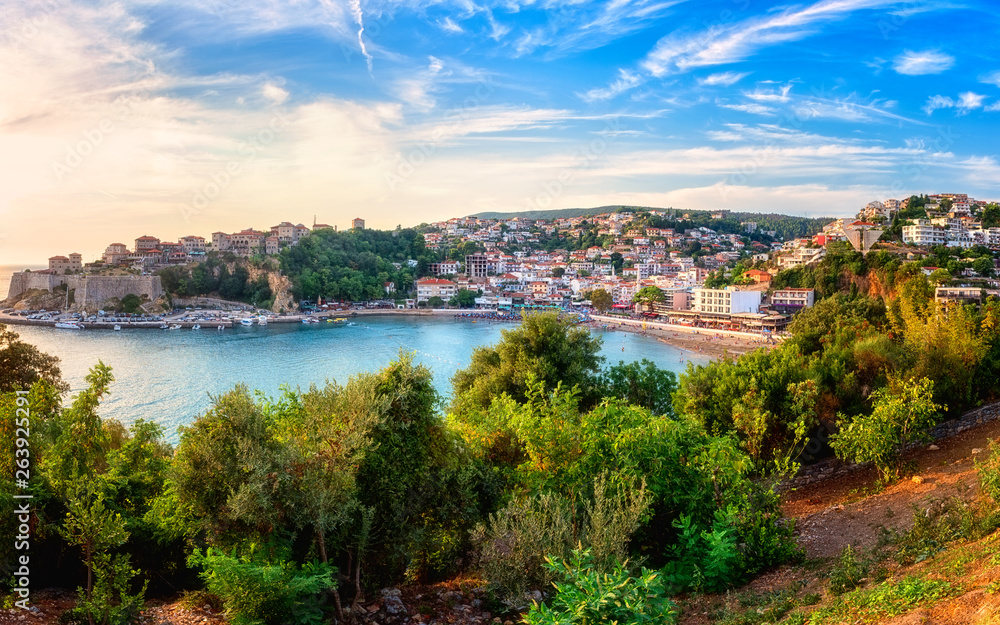 Panoramic view of Ulcinj at sunset, medieval mediterranean town, popular summer tourist resort in Montenegro, scenic travel background