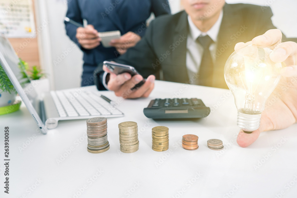 Fototapeta premium business hand showing creative business strategy with light bulb as concept holding light bulb, new idea