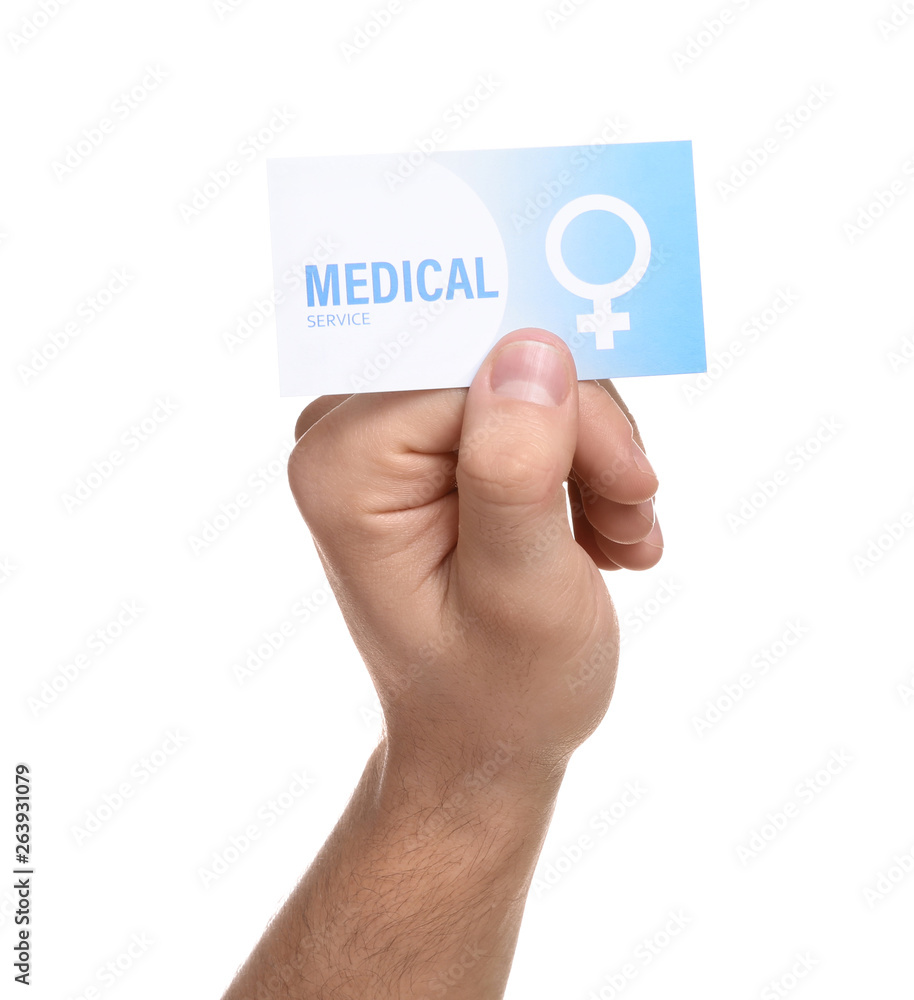 Man holding medical business card isolated on white, closeup. Women's health service Man holding medical business card isolated on white, closeup. Women's health service