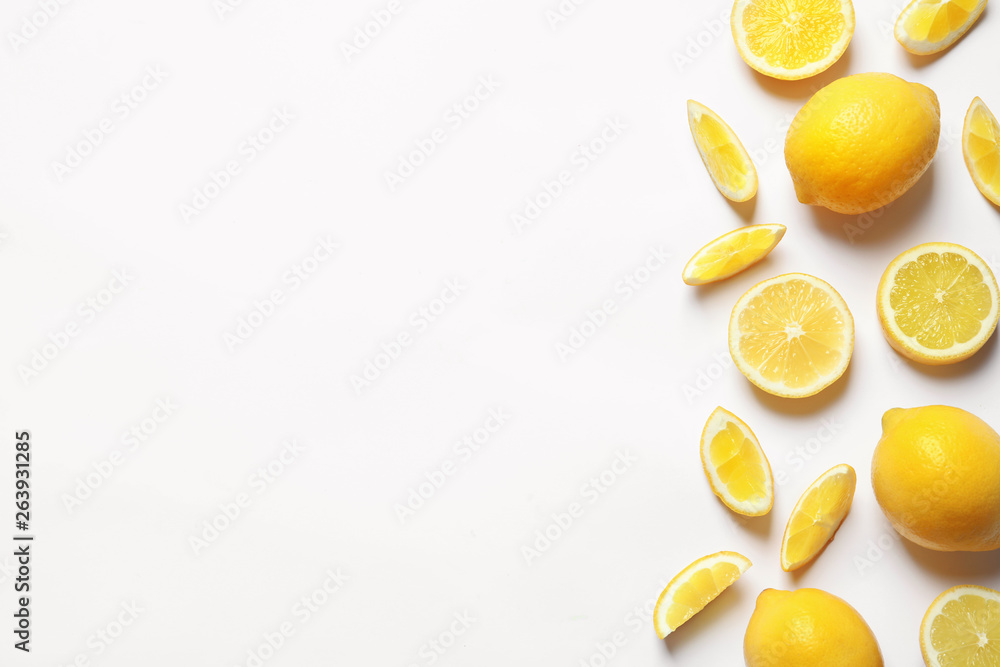 Fresh lemons on white background, top view. Citrus fruits Fresh lemons on white background, top view. Citrus fruits