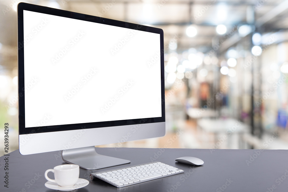 Fototapeta premium Desk Laptop with blank screen on table