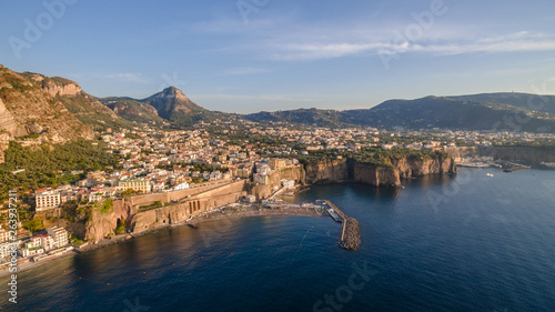 Aerial sunset View of the Sorrento coast. Meta beach, travel concept, space for text, travel to Italy, Europe vacation. Mountains