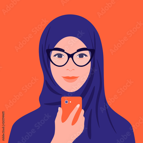 Portrait of an arabian woman in hijab and glasses. Muslim girl avatar. Smartphone. Vector flat illustration