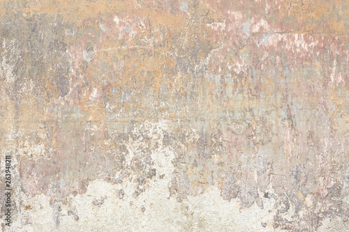 Old chipped and faded wall texture background