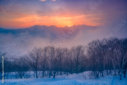 Sunset view on the top of Moiwa mountain in winter snow