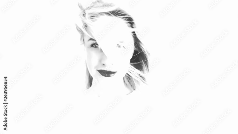 Beautiful woman with hair blowing in the wind. Change of emotions. Black and white sketch. Slow motion. Beautiful woman with hair blowing in the wind. Change of emotions. Black and white sketch. Slow motion.