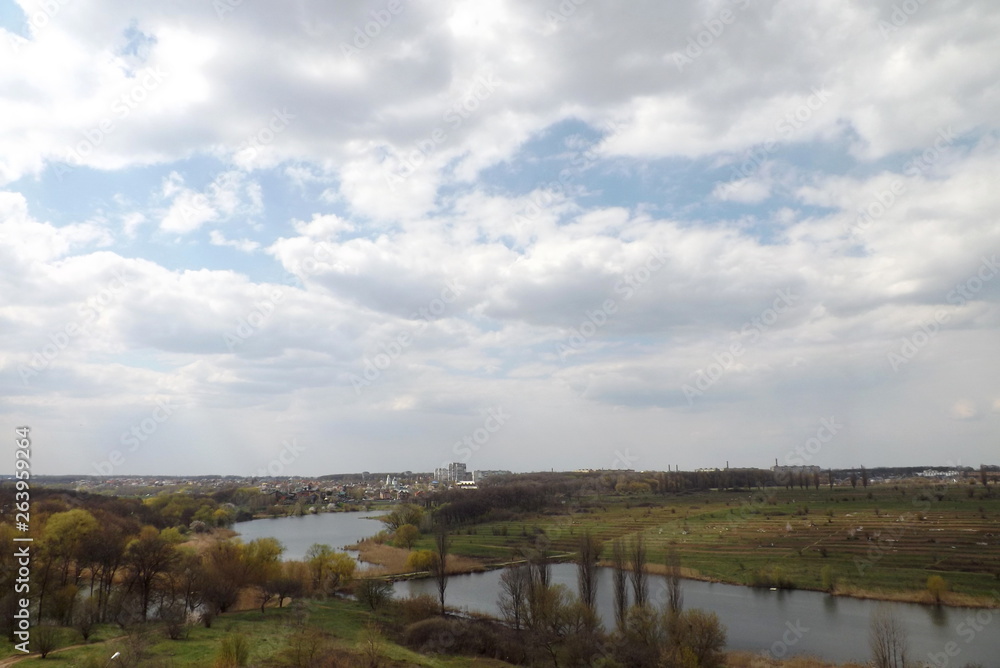 landscape with river and clouds