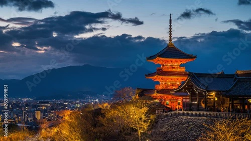 Time lapse of Kyoto city with red pagoda at twilight, Japan. zoom in photo