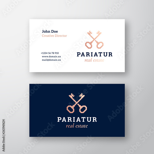 Real Estate Keys Abstract Vector Sign or Logo and Business Card Template. Premium Stationary Realistic Mock Up. Crossed Keys Sillhouettes with Classy Retro Typography. Vintage Vector Emblem
