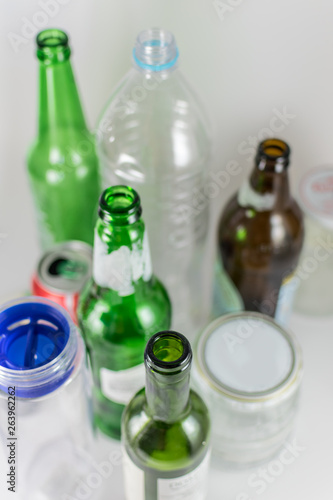 Sets of empty pot, bowl, glass bottles and plastic bottles with no label on a white background. Reuse, Eco-Friendly, Environment, Conservation, Sustainable and Resources concept.