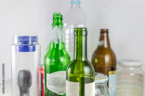 Sets of empty pot, bowl, glass bottles and plastic bottles with no label on a white background. Reuse, Eco-Friendly, Environment, Conservation, Sustainable and Resources concept.