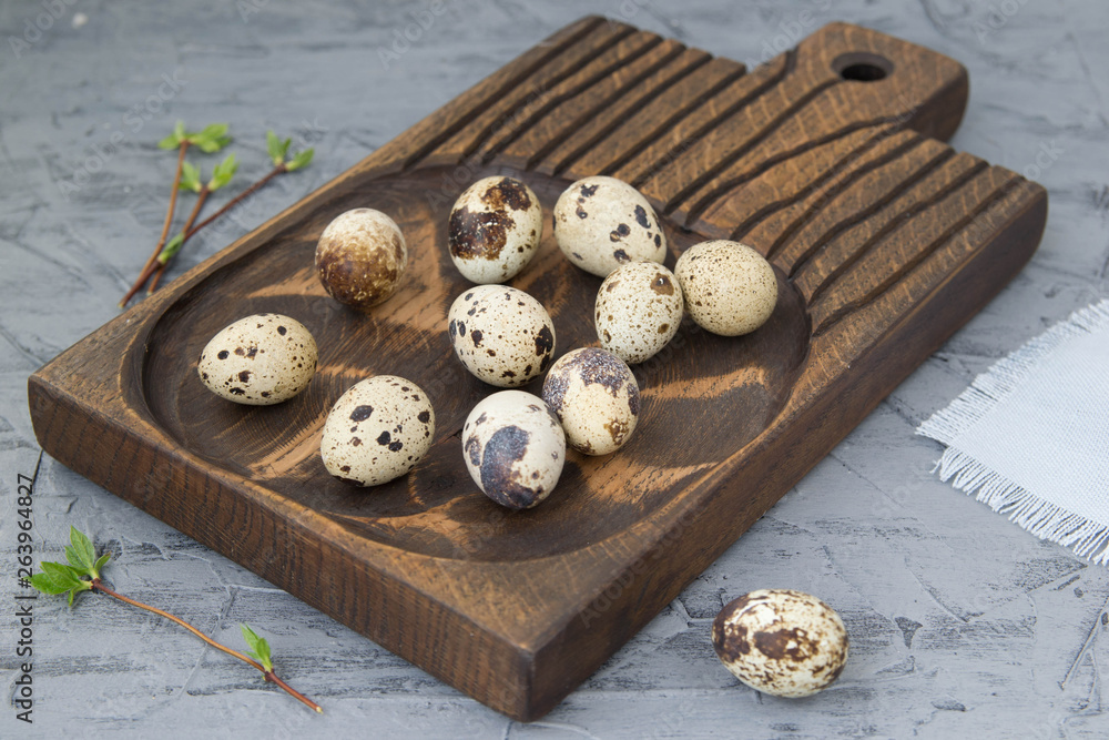 Eggs are lying on a wooden board. Happy Easter. Congratulatory Easter background. Eggs are lying on a wooden board. Happy Easter. Congratulatory Easter background.
