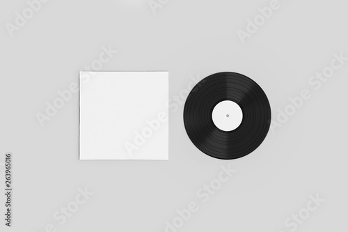 Vinyl Record with Cover Mock-up on a soft gray background. Disco party. Retro design. Front view.