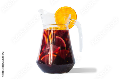 Refreshing sangria fruit punch beverage in glass pitcher