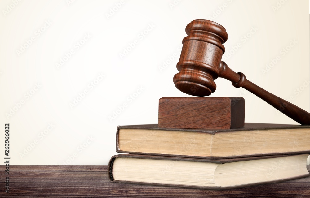 Justice Scales and books and wooden gavel on table. Justice concept Justice Scales and books and wooden gavel on table. Justice concept