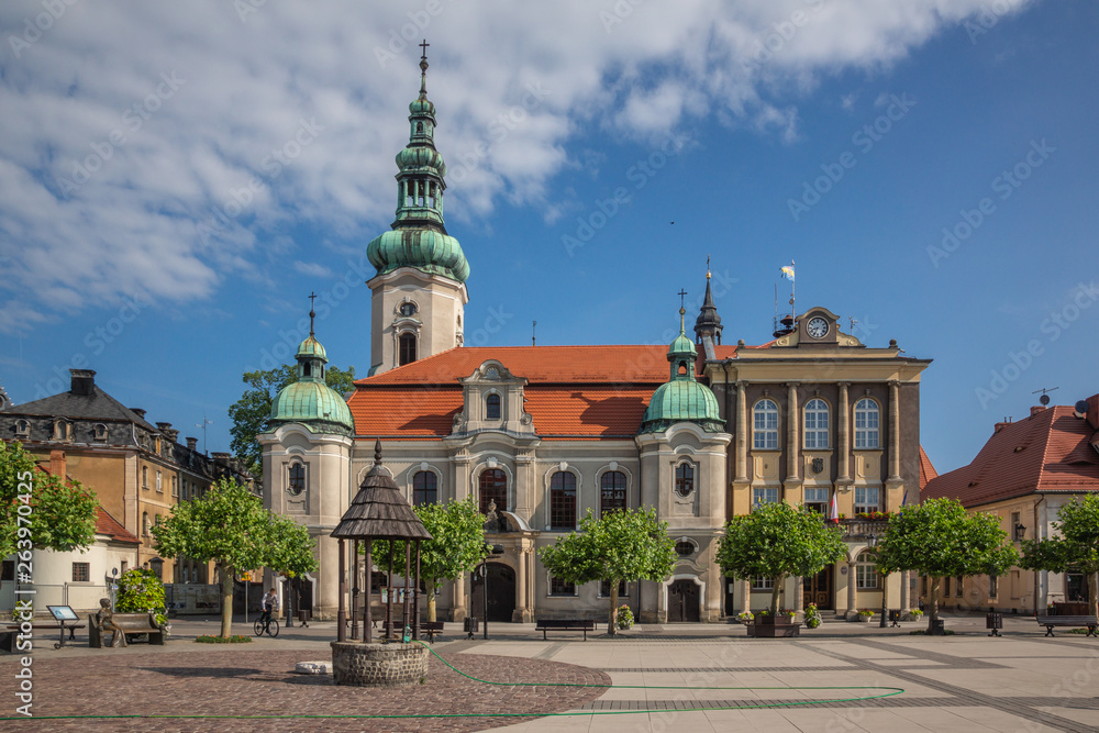 Church and town hall in Pszczyna, Silesia, Poland