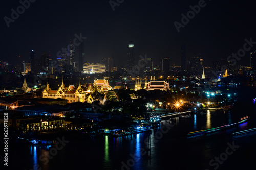 Night Cityscape or landscape view of bangkok thailand with Chao Phraya River.