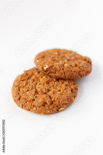 oat cookies  on white background photo with nuts healthy food  for the diet