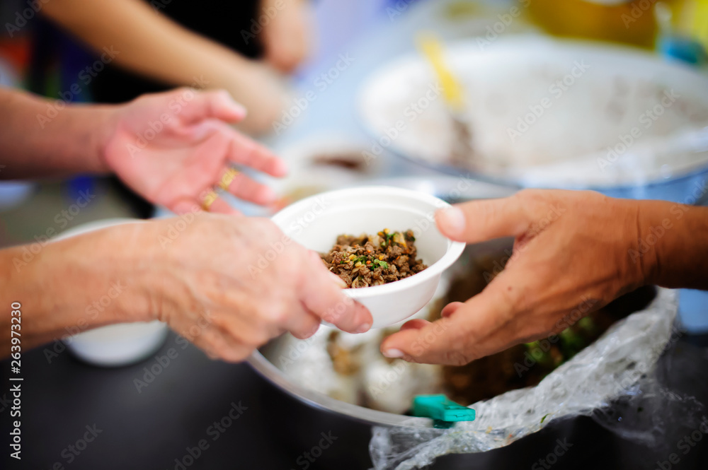 concept of begging food : Beggar begs food from donors : concept of poverty in Asian society