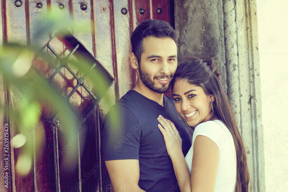 Couple in love outside a rustic house. Couple in love outside a rustic house.