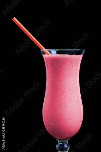Strawberry smoothie isolated on black background