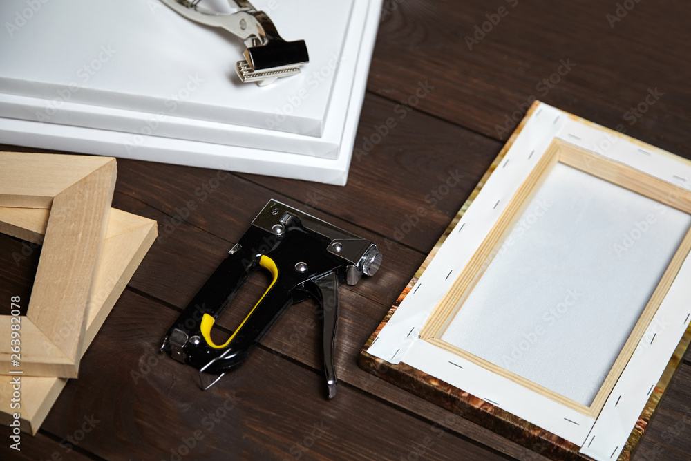 Canvas stretching on wood stretcher bar. Photo printed on canvas (back