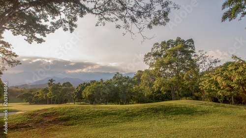 Panoramic view of one hole in a golf course, captured early in the morning in the Andean mountains of southern Colombia.