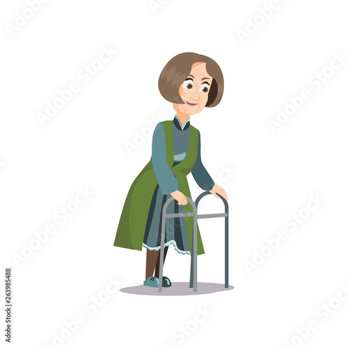 Old senior woman walking with metal walker at home