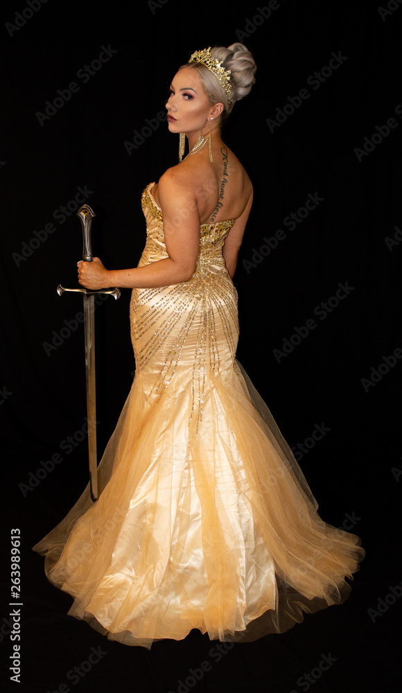 Fototapeta premium Golden goddess in crown with sword