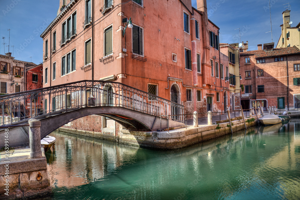 Small bridge and canal in Venice, Italy