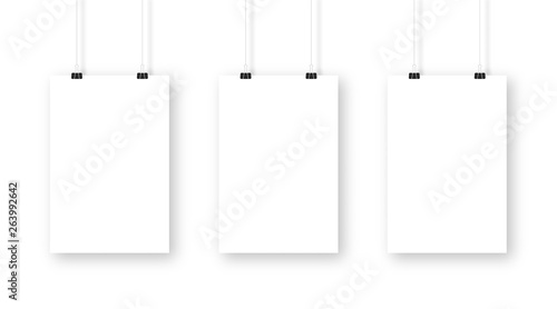 Poster mockup isolated on white background. Realistic blank poster template. Set of vertical frame mockups hanging on the wall. Vector