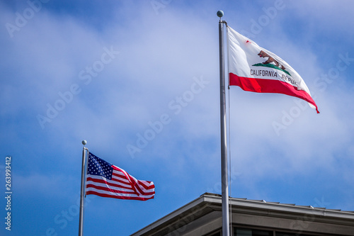 american flag and california state flag