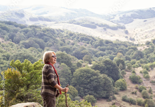 Italy, Sicily, Castelbuono, Parco delle Madonie, senior woman hiking photo