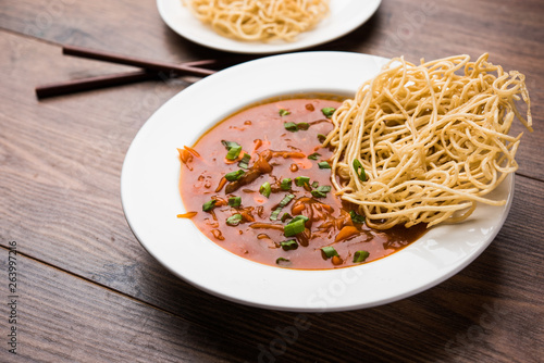 American chop suey/ chopsuey is a popular indochinese food. served in a bowl with chop sticks. selective focus