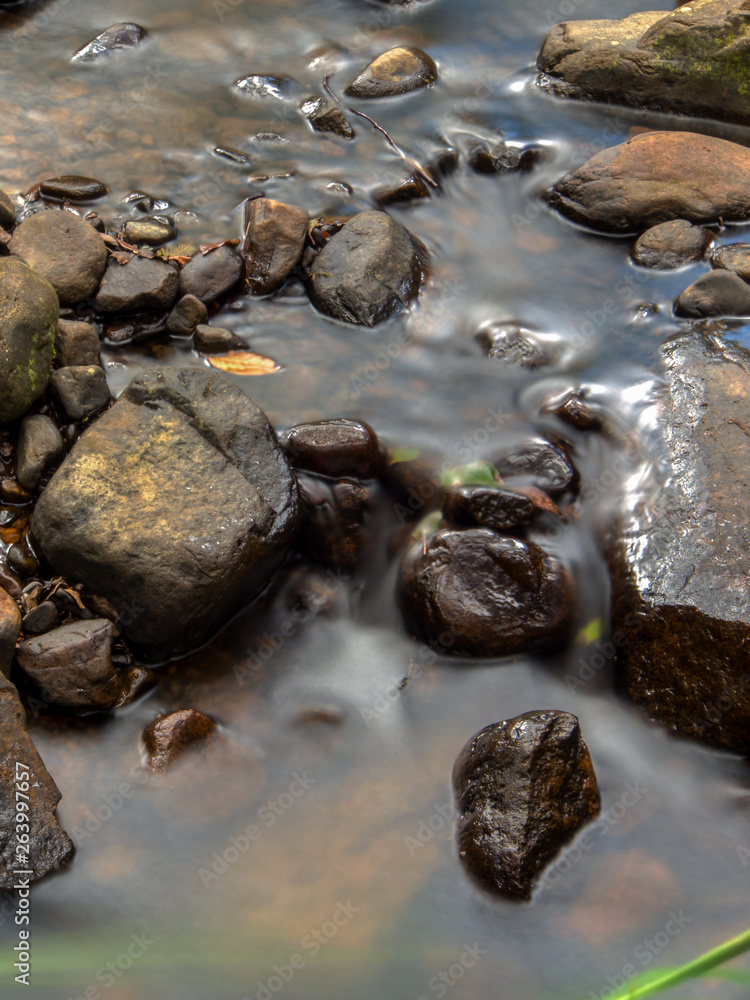 Multiple exposure of the cold stream of a ravine in the mountains near the colonial town of Villa de Leyva, in the central region of the Colombian Andes. Multiple exposure of the cold stream of a ravine in the mountains near the colonial town of Villa de Leyva, in the central region of the Colombian Andes.