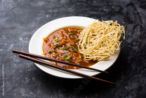 American chop suey/ chopsuey is a popular indochinese food. served in a bowl with chop sticks. selective focus