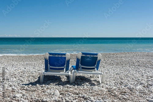 Two chairs on the beach