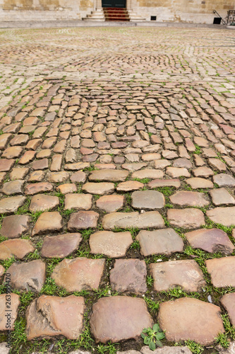 Old square paved with large cobblestones
