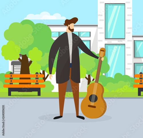 Talented Musician Guy Holding Guitar on Street.