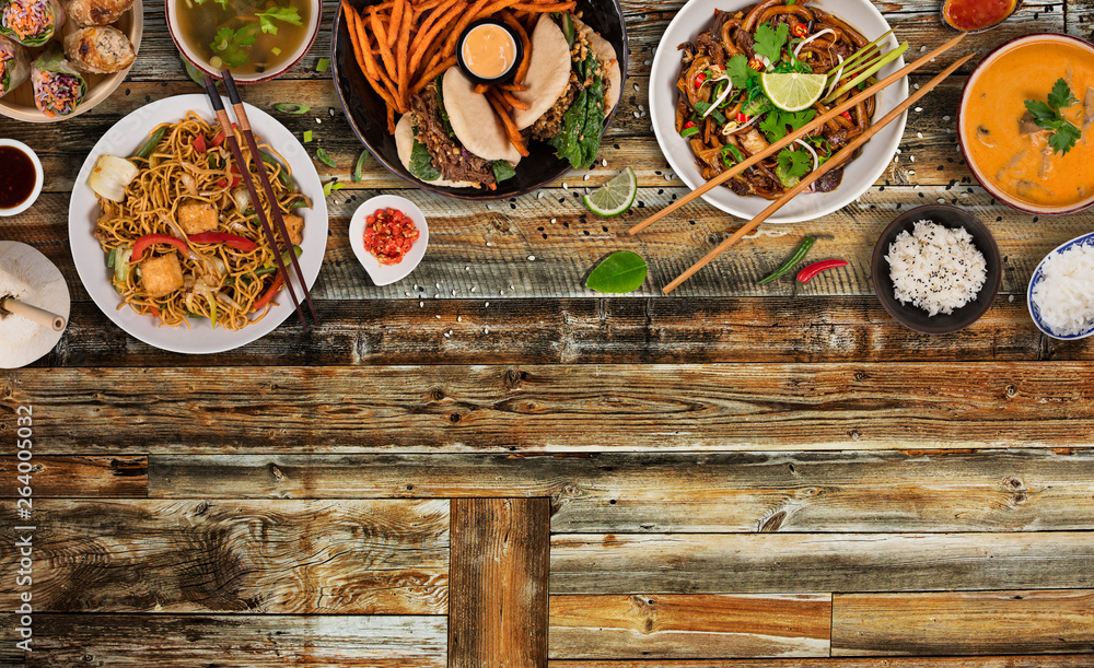 Asian food background with various ingredients on rustic wooden table , top view. Asian food background with various ingredients on rustic wooden table , top view.