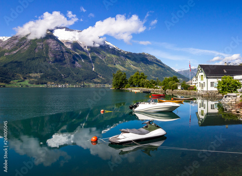 boats on Oppstryn lake in Hjelle in Norway photo