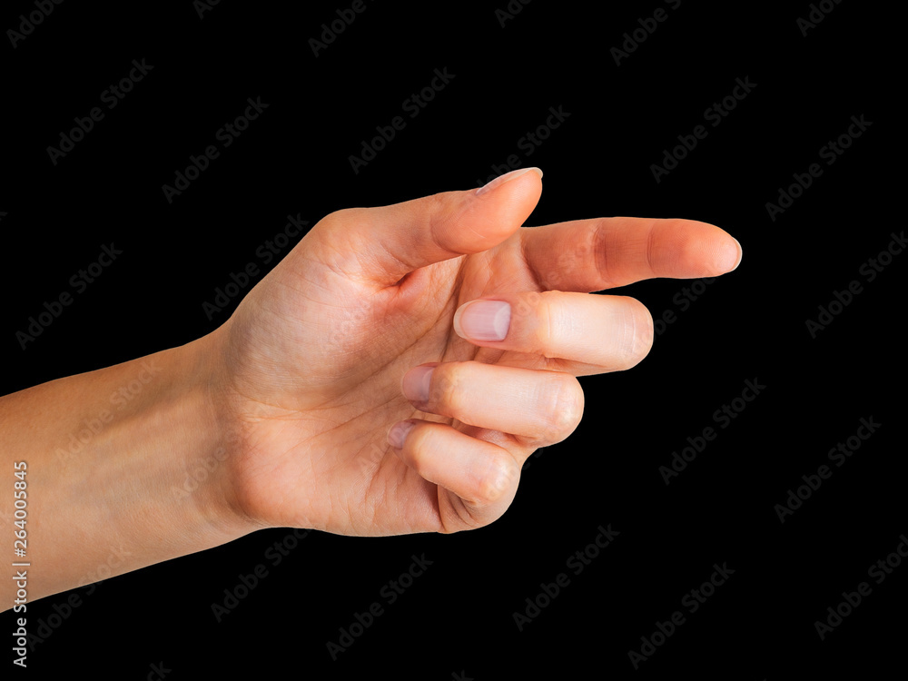 Woman hand with the index finger pointing up or showing direction Woman hand with the index finger pointing up or showing direction
