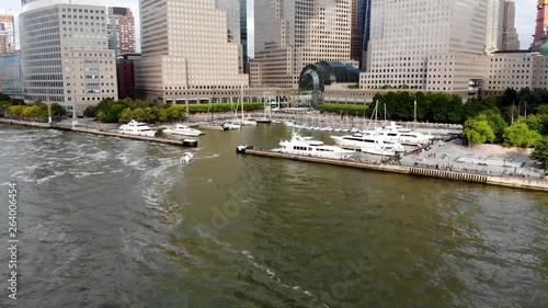 Aerial view of boats docked at the North Cove Marina (Hudson River) at Battery Park in Manhattan with Brookfield Place Complex and offices buildings on the background. New York, USA.