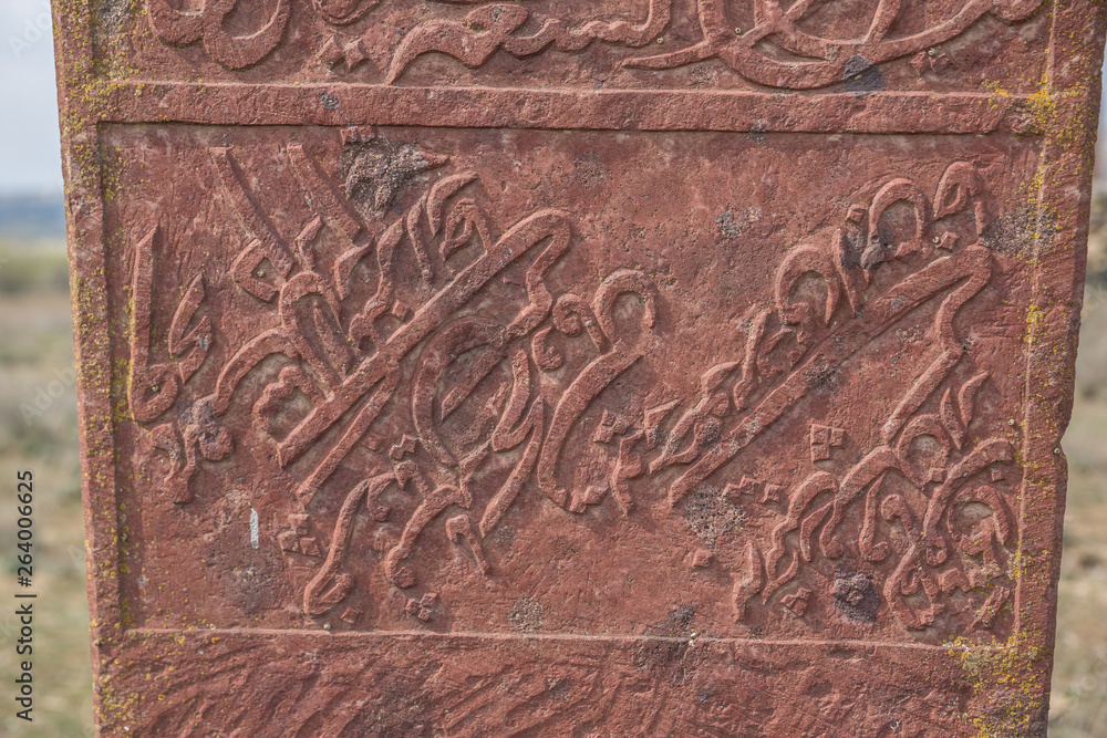 Ancient muslim cemetery near Agstafa, Azerbaijan with writings on farsi for graphic and web design, for website or mobile app. Ancient muslim cemetery near Agstafa, Azerbaijan with writings on farsi for graphic and web design, for website or mobile app.