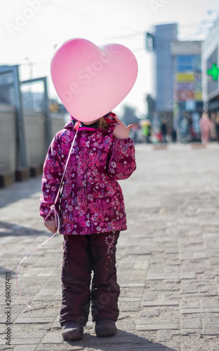 girl with a pink ball