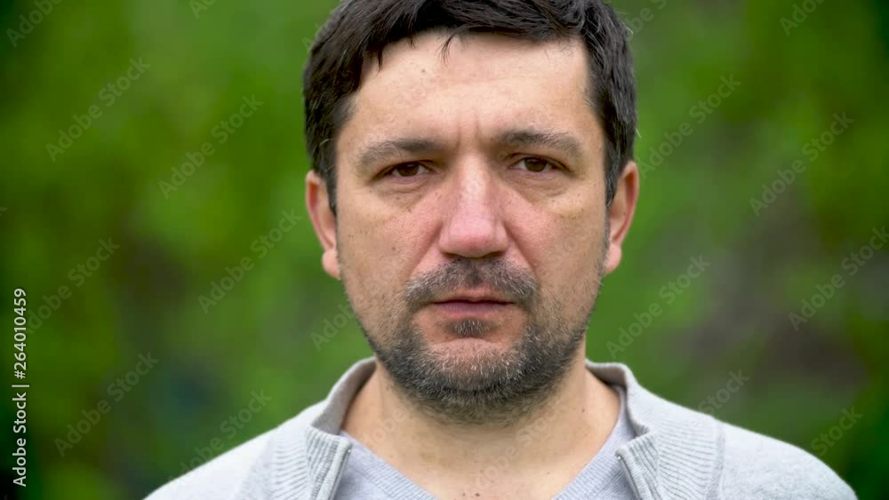 Closeup portrait of an adult man with a beard Closeup portrait of an adult man with a beard