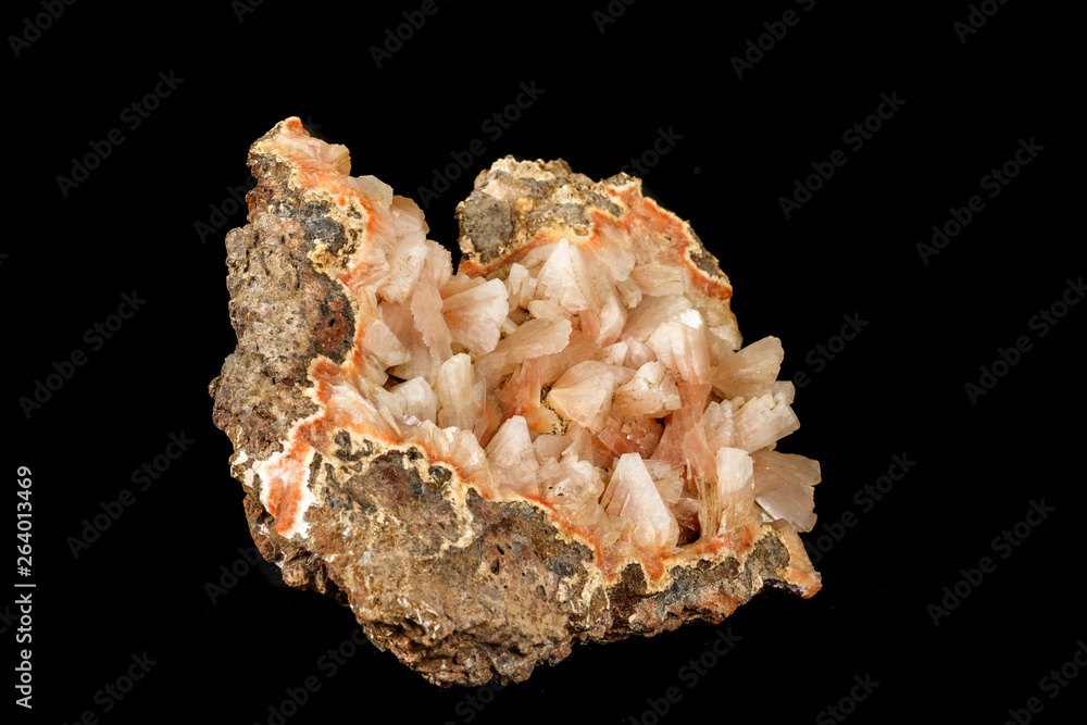 Macro of a stone Stilbite mineral on a black background Macro of a stone Stilbite mineral on a black background
