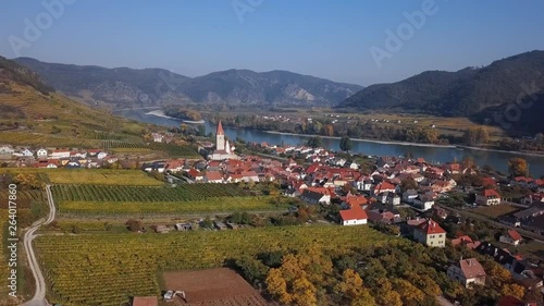 Aerial panorama of Weisenkirchen in der Wachau town and vineyards. Wachau valley, Austria photo